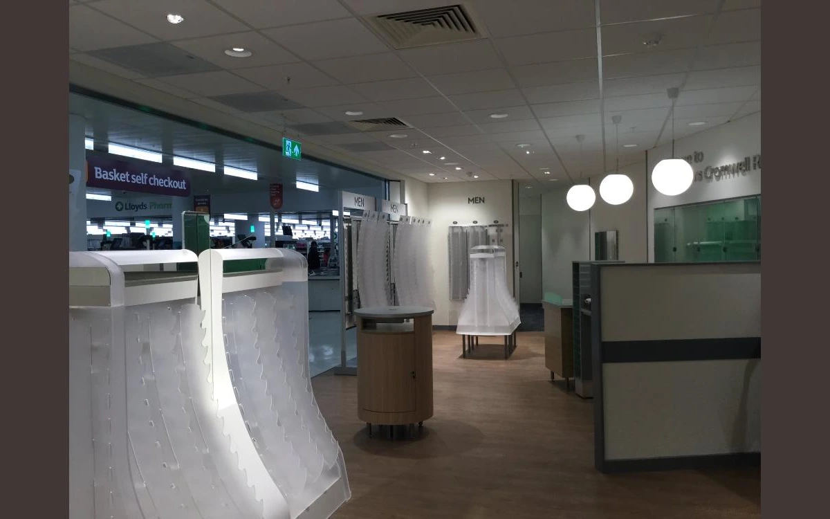 Decorative pendant and recessed lighting installed for a pharmacy retail fit-out